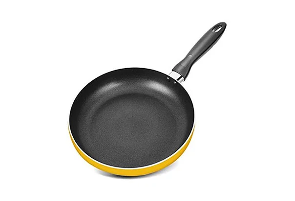 yellow cooking wok